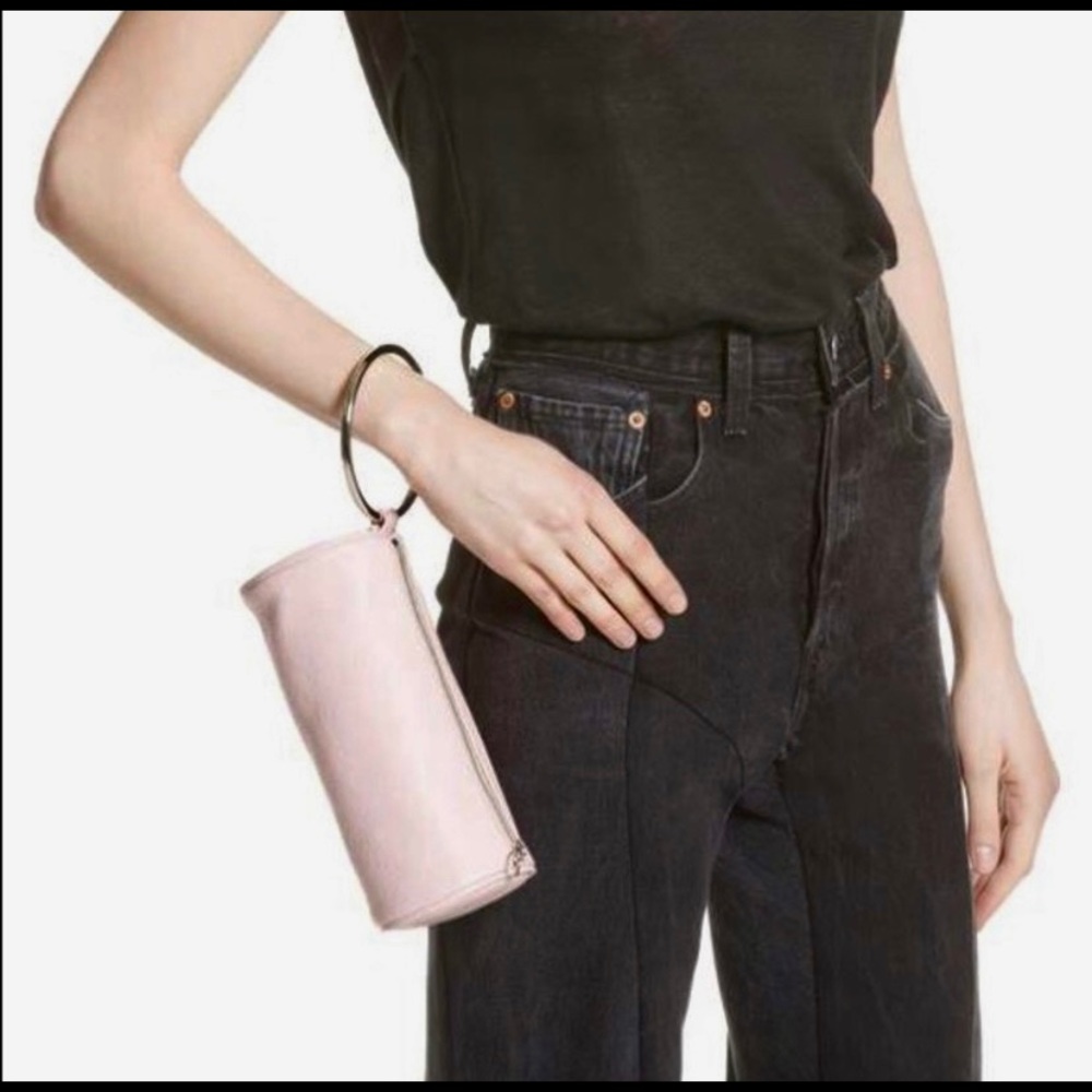 KARA pebbled leather wristlet clutch. Blush pink.